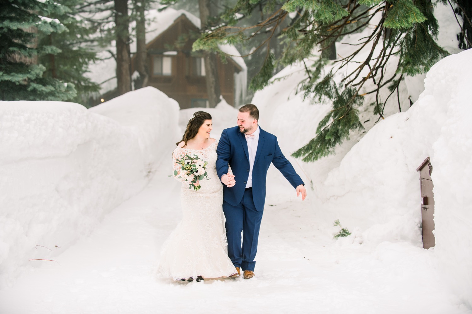 Bride and groom portraits in snow